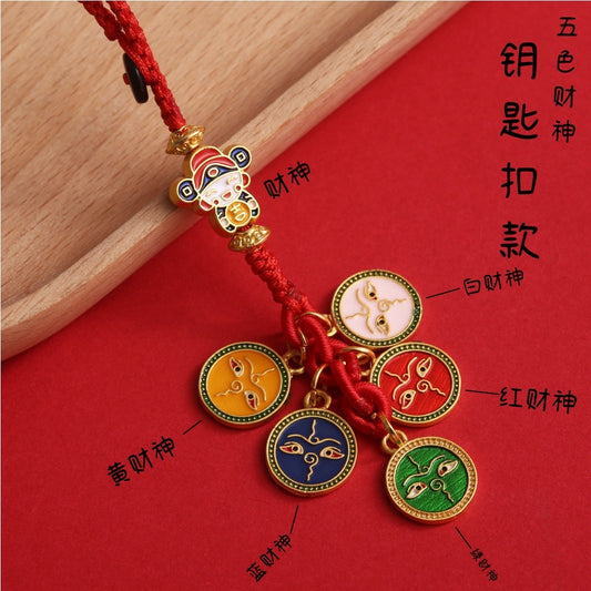 A red lucky charm hanging ornament with intricate details and traditional Chinese elements, featuring various auspicious symbols and knots.