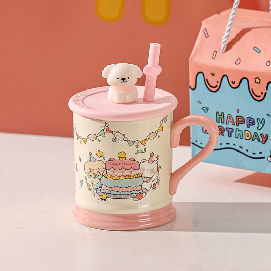 Pink mug with cartoon design, white teddy bear on lid, and pink straw against a colorful background.
