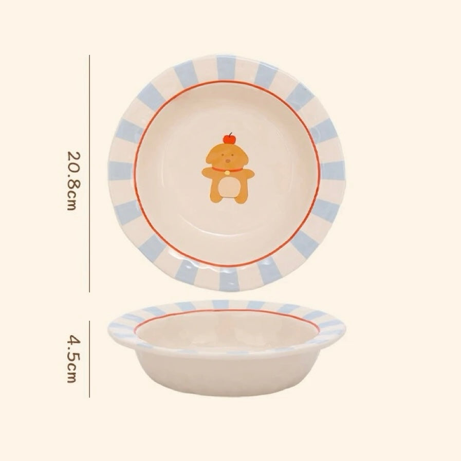 Two ceramic bowls with blue and red stripes and a cartoon character on a white background.