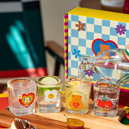 Kawaii Rainbow Flower Soju Glass Set - Rainbow Heart and Lucky Bear glasses held up close