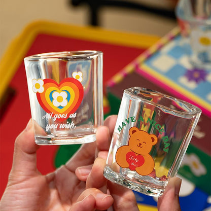 Kawaii Rainbow Flower Soju Glass Set - all 4 glasses styled on a wooden board with drinks poured