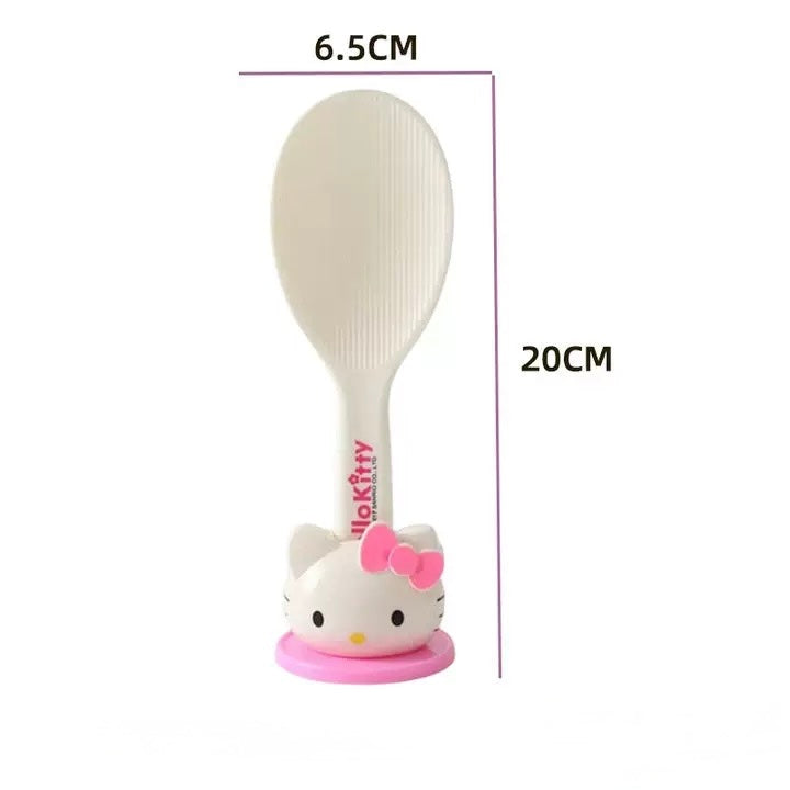 A Hello Kitty spoon with a pink base featuring a Hello Kitty face and bow, shown with dimension lines indicating a height of 20CM and a width of 6.5CM on a white background.