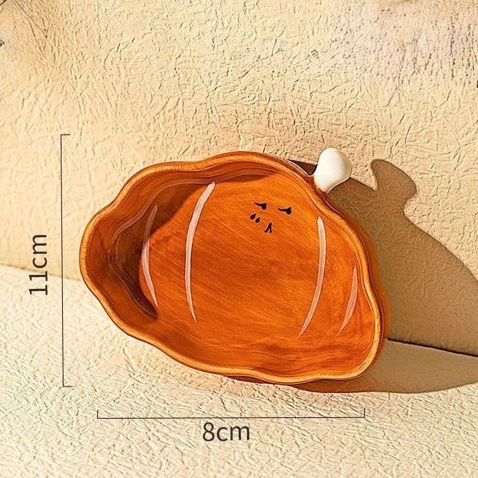 Wooden tray with a bear design and measurements on a beige background