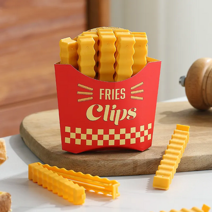 A set of fries-shaped bag clips in a red carton, resembling a fast-food fries container, with a single clip shown separately with dimensions.