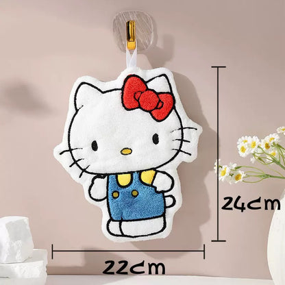 Hello Kitty plush toy with measurements on a neutral background