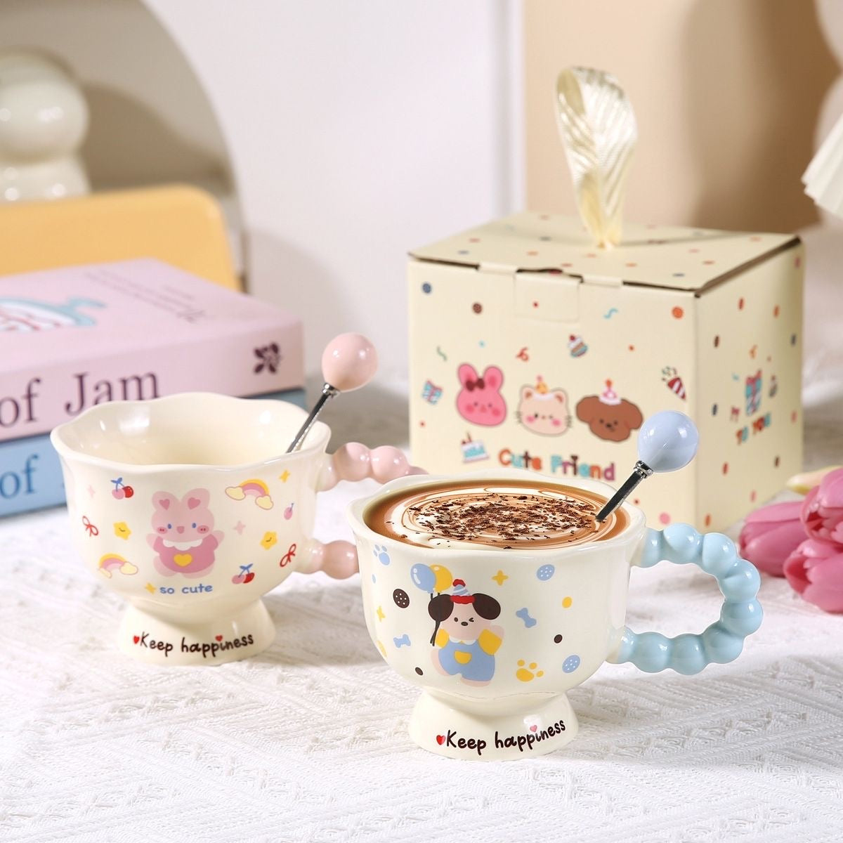 Two cartoon-themed mugs with handles on a white surface, one filled with a hot beverage.